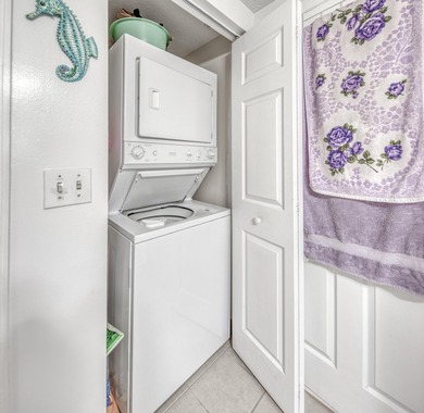 Discover your ultimate urban retreat in this one-bedroom on Lake Worth Municipal Golf Course in Florida - for sale on GolfHomes.com, golf home, golf lot