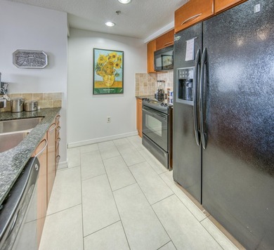 Discover your ultimate urban retreat in this one-bedroom on Lake Worth Municipal Golf Course in Florida - for sale on GolfHomes.com, golf home, golf lot