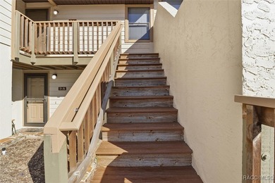 This Greenbriar upstairs unit offers a serene living experience on Citrus Hills Golf Club in Florida - for sale on GolfHomes.com, golf home, golf lot