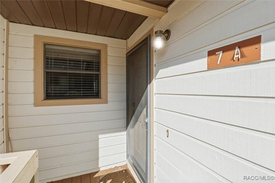 This Greenbriar upstairs unit offers a serene living experience on Citrus Hills Golf Club in Florida - for sale on GolfHomes.com, golf home, golf lot