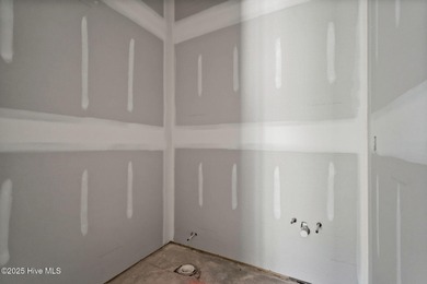 Situated within the private, award-winning Thistle Golf Club in on Thistle Golf Club in North Carolina - for sale on GolfHomes.com, golf home, golf lot