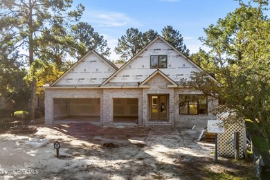 Situated within the private, award-winning Thistle Golf Club in on Thistle Golf Club in North Carolina - for sale on GolfHomes.com, golf home, golf lot