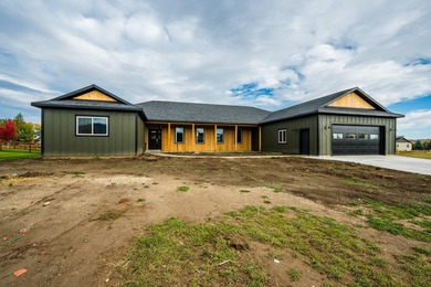 This beautiful new home in the Powder Horn Golf Community offers on The Powder Horn Golf Club - Mountain in Wyoming - for sale on GolfHomes.com, golf home, golf lot
