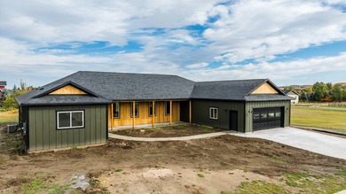 This beautiful new home in the Powder Horn Golf Community offers on The Powder Horn Golf Club - Mountain in Wyoming - for sale on GolfHomes.com, golf home, golf lot