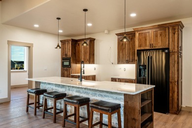 This beautiful new home in the Powder Horn Golf Community offers on The Powder Horn Golf Club - Mountain in Wyoming - for sale on GolfHomes.com, golf home, golf lot