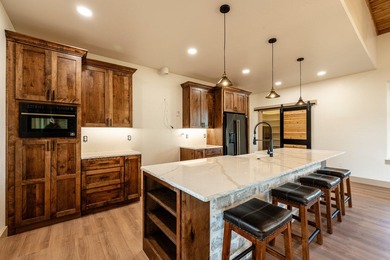 This beautiful new home in the Powder Horn Golf Community offers on The Powder Horn Golf Club - Mountain in Wyoming - for sale on GolfHomes.com, golf home, golf lot