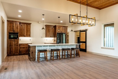 This beautiful new home in the Powder Horn Golf Community offers on The Powder Horn Golf Club - Mountain in Wyoming - for sale on GolfHomes.com, golf home, golf lot
