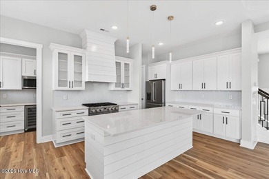 Another exceptional signature residence by Blue Turtle Holdings on Brunswick Plantation and Golf Resorts in North Carolina - for sale on GolfHomes.com, golf home, golf lot