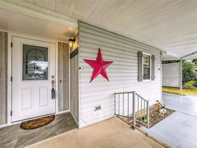 Location is everything and this home has it! Sit on one of the on Zellwood Station Country Club in Florida - for sale on GolfHomes.com, golf home, golf lot