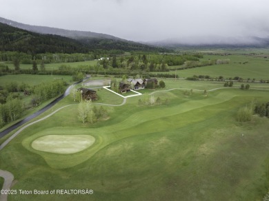 This beautifully maintained 4-bedroom, 4.5-bath log cabin in on Teton Springs Resort and Club in Idaho - for sale on GolfHomes.com, golf home, golf lot