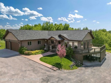 This home is thoughtfully designed to take full advantage of its on Star Valley RV Golf Course in Wyoming - for sale on GolfHomes.com, golf home, golf lot