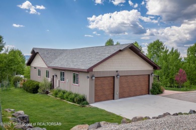 This home is thoughtfully designed to take full advantage of its on Star Valley RV Golf Course in Wyoming - for sale on GolfHomes.com, golf home, golf lot