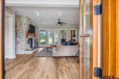 Nestled among meticulously manicured fairways in the prestigious on Hide-A-Way Lake Golf Course in Texas - for sale on GolfHomes.com, golf home, golf lot