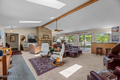 This Mediterranean-style brick home offers panoramic views of on Harbour Point Golf Club in North Carolina - for sale on GolfHomes.com, golf home, golf lot