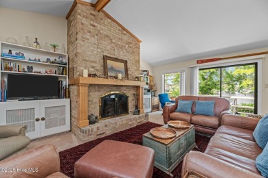 This Mediterranean-style brick home offers panoramic views of on Harbour Point Golf Club in North Carolina - for sale on GolfHomes.com, golf home, golf lot