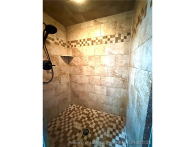 Welcome to 6208 Falkland, a beautifully appointed residence on Kings Grant Golf and Country Club in North Carolina - for sale on GolfHomes.com, golf home, golf lot