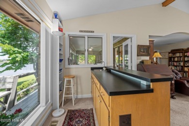 This Mediterranean-style brick home offers panoramic views of on Harbour Point Golf Club in North Carolina - for sale on GolfHomes.com, golf home, golf lot