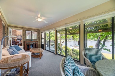 This Mediterranean-style brick home offers panoramic views of on Harbour Point Golf Club in North Carolina - for sale on GolfHomes.com, golf home, golf lot