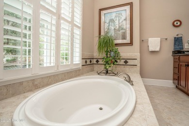 Hidden gem on a maturely landscaped & private .40/acre home site on Ocean Ridge Plantation in North Carolina - for sale on GolfHomes.com, golf home, golf lot