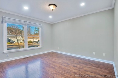 Welcome to 6208 Falkland, a beautifully appointed residence on Kings Grant Golf and Country Club in North Carolina - for sale on GolfHomes.com, golf home, golf lot