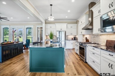 Nestled among meticulously manicured fairways in the prestigious on Hide-A-Way Lake Golf Course in Texas - for sale on GolfHomes.com, golf home, golf lot