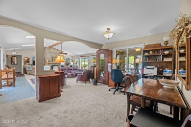 This Mediterranean-style brick home offers panoramic views of on Harbour Point Golf Club in North Carolina - for sale on GolfHomes.com, golf home, golf lot