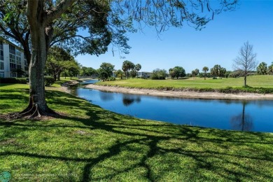 This is it! The most stunning unit in Wynmoor! Overlooking on Wynmoor Golf Course in Florida - for sale on GolfHomes.com, golf home, golf lot