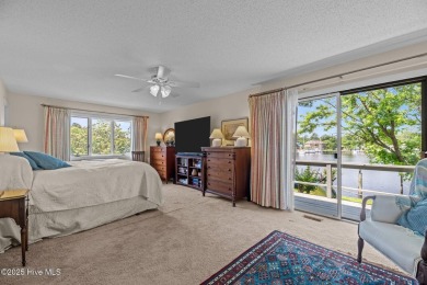 This Mediterranean-style brick home offers panoramic views of on Harbour Point Golf Club in North Carolina - for sale on GolfHomes.com, golf home, golf lot