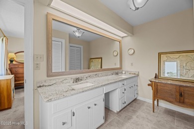 This Mediterranean-style brick home offers panoramic views of on Harbour Point Golf Club in North Carolina - for sale on GolfHomes.com, golf home, golf lot