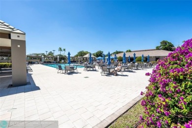 This is it! The most stunning unit in Wynmoor! Overlooking on Wynmoor Golf Course in Florida - for sale on GolfHomes.com, golf home, golf lot