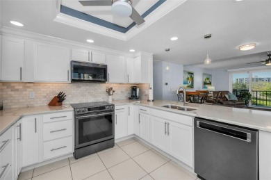 Located within a beautiful gated Belleair community, surrounding on Belleair Country Club in Florida - for sale on GolfHomes.com, golf home, golf lot