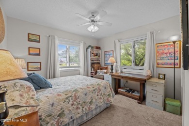 This Mediterranean-style brick home offers panoramic views of on Harbour Point Golf Club in North Carolina - for sale on GolfHomes.com, golf home, golf lot