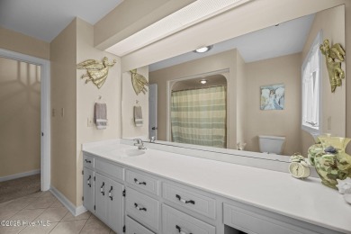 This Mediterranean-style brick home offers panoramic views of on Harbour Point Golf Club in North Carolina - for sale on GolfHomes.com, golf home, golf lot