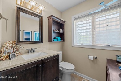 This Mediterranean-style brick home offers panoramic views of on Harbour Point Golf Club in North Carolina - for sale on GolfHomes.com, golf home, golf lot