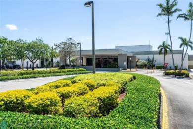 This is it! The most stunning unit in Wynmoor! Overlooking on Wynmoor Golf Course in Florida - for sale on GolfHomes.com, golf home, golf lot