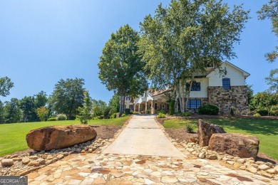 One of a kind custom home in River Forest. This home boasts curb on The Club River Forest in Georgia - for sale on GolfHomes.com, golf home, golf lot