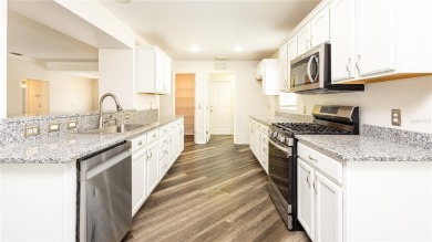 SELLER IS MOVTIVATED!  Welcome to this 3 BEDROOM, 2 BATHROOM on Arlington Ridge Golf Club in Florida - for sale on GolfHomes.com, golf home, golf lot