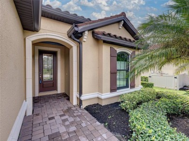 Stunning 3BR/3BA home on a pond located in the gated Esplanade on Esplanade Golf and Country at Lakewood Ranch in Florida - for sale on GolfHomes.com, golf home, golf lot