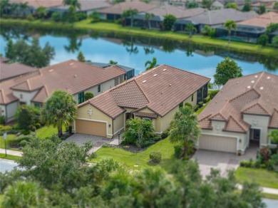 Stunning 3BR/3BA home on a pond located in the gated Esplanade on Esplanade Golf and Country at Lakewood Ranch in Florida - for sale on GolfHomes.com, golf home, golf lot