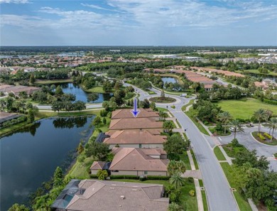 Stunning 3BR/3BA home on a pond located in the gated Esplanade on Esplanade Golf and Country at Lakewood Ranch in Florida - for sale on GolfHomes.com, golf home, golf lot