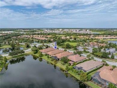 Stunning 3BR/3BA home on a pond located in the gated Esplanade on Esplanade Golf and Country at Lakewood Ranch in Florida - for sale on GolfHomes.com, golf home, golf lot