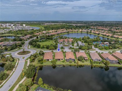 Stunning 3BR/3BA home on a pond located in the gated Esplanade on Esplanade Golf and Country at Lakewood Ranch in Florida - for sale on GolfHomes.com, golf home, golf lot