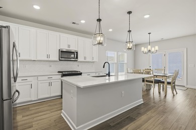 Welcome to this beautifully designed single-level 3-bedroom on River Oaks Golf Plantation  in South Carolina - for sale on GolfHomes.com, golf home, golf lot