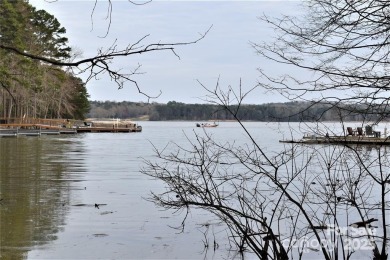 This Badin Lake waterfront lot is located in the prestigious on Old North State Club at Uwharrie Point Golf community in North Carolina - for sale on GolfHomes.com, golf home, golf lot