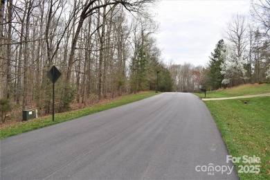 This Badin Lake waterfront lot is located in the prestigious on Old North State Club at Uwharrie Point Golf community in North Carolina - for sale on GolfHomes.com, golf home, golf lot