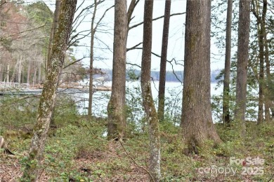 This Badin Lake waterfront lot is located in the prestigious on Old North State Club at Uwharrie Point Golf community in North Carolina - for sale on GolfHomes.com, golf home, golf lot