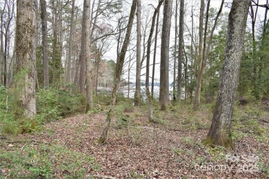 This Badin Lake waterfront lot is located in the prestigious on Old North State Club at Uwharrie Point Golf community in North Carolina - for sale on GolfHomes.com, golf home, golf lot