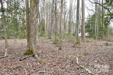 This Badin Lake waterfront lot is located in the prestigious on Old North State Club at Uwharrie Point Golf community in North Carolina - for sale on GolfHomes.com, golf home, golf lot