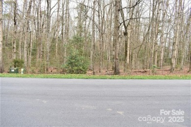 This Badin Lake waterfront lot is located in the prestigious on Old North State Club at Uwharrie Point Golf community in North Carolina - for sale on GolfHomes.com, golf home, golf lot