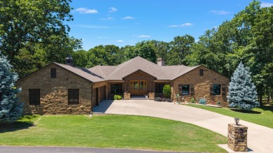 This stunning home offers timeless craftsmanship, luxurious on The Coves Golf Course in Oklahoma - for sale on GolfHomes.com, golf home, golf lot